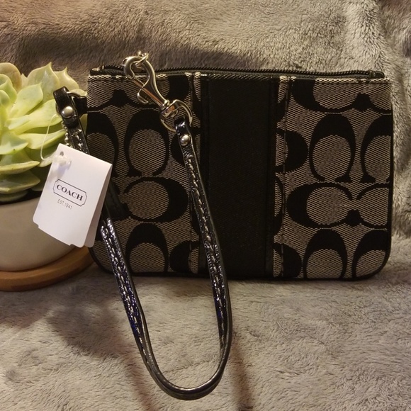 Coach Handbags - COACH Signature Black Wristlet